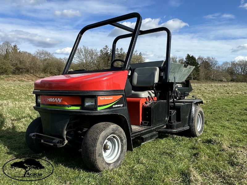 Cushman Truckster and Turfco Spinner