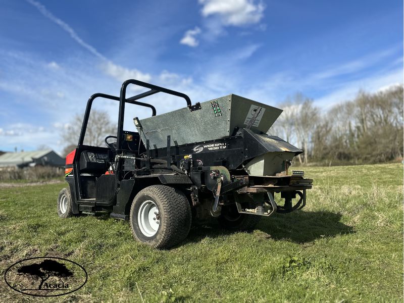 Cushman Truckster and Turfco Spinner