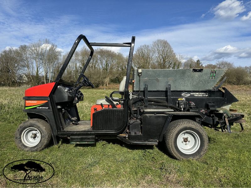 Cushman Truckster and Turfco Spinner